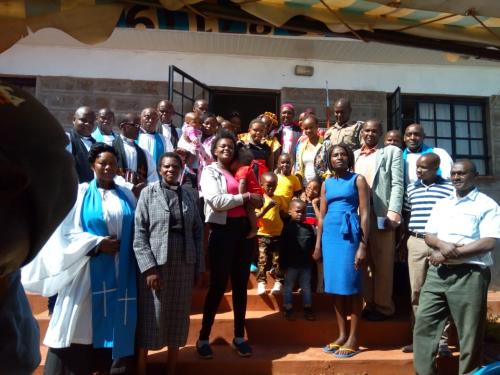 Invited-speakers-and-guests-posing-for-a-photo-infront-of-the-new-Kiota-home-at-Muthithi-Muranga-on-2nd-Feb-2019 (1)